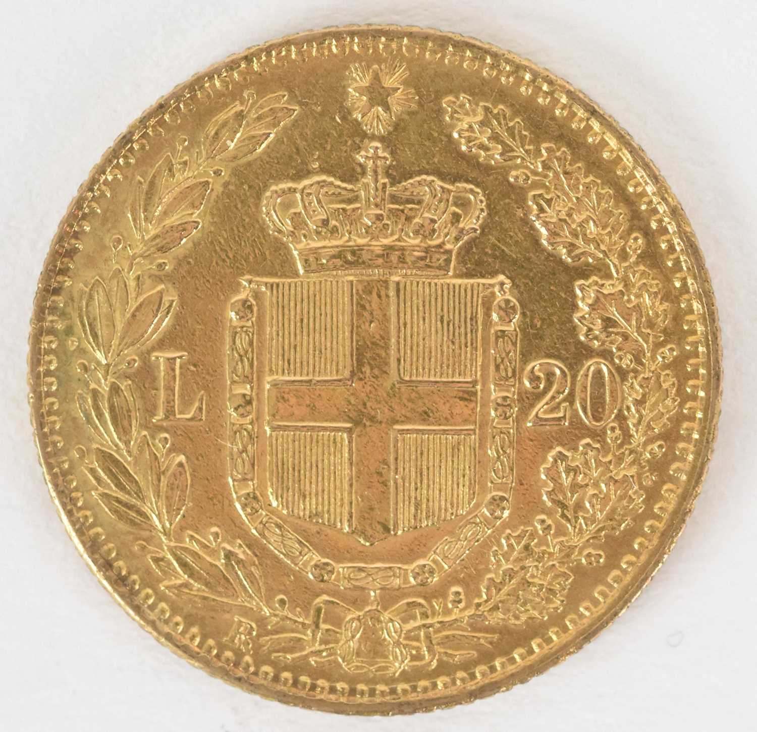 Lot 1580 - An Umberto I 1882 twenty lira gold coin,...
