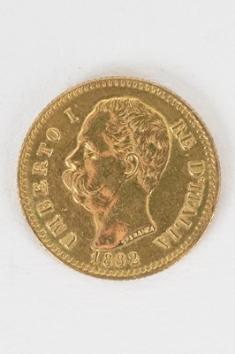 Lot 1580 - An Umberto I 1882 twenty lira gold coin,...