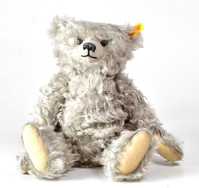 Lot 352 - STEIFF; a grey mohair bear, with growler, gold...