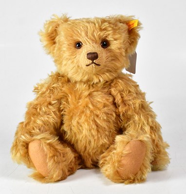 Lot 353 - STEIFF; a golden bear, with growler, gold...