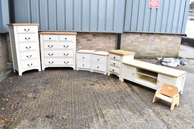 Lot 81 - A modern cream blanket box, three cream wooden...