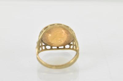 Lot 1425 - A 9ct gold ring set with a 1/20th ounce Angel...