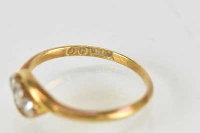 Lot 1529 - An 18ct gold ring with three small bezel set...