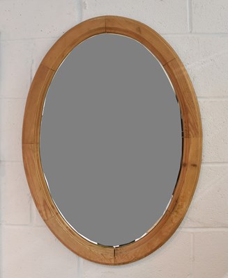 Lot 87 - A modern pine framed oval wall mirror, height...