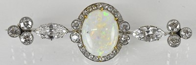 Lot 1352 - A 950 grade platinum diamond and opal set...