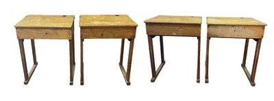 Lot 101 - Four early 20th century light oak school desks,...