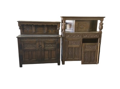 Lot 49 - A reproduction carved oak court cupboard, with...