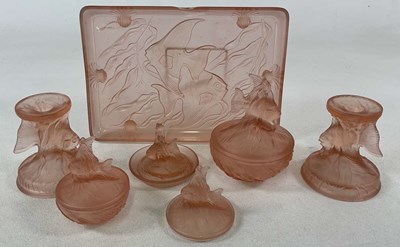 Lot 245 - A blush pink glass dressing table set, to...