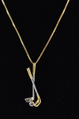 Lot 1388 - GOLFING INTEREST; a double golf club and golf...
