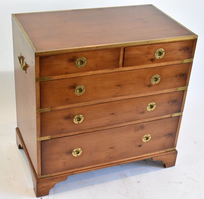 Lot 59 - A reproduction yew and brass mounted military...