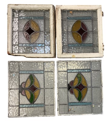 Lot 345 - A pair of framed stained glass windows, 58 x...