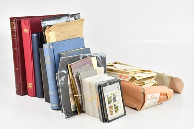 Lot 742 - WORLD STAMPS; in various albums, loose in...