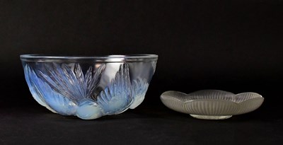 Lot 239 - A relief moulded glass bowl, decorated with...