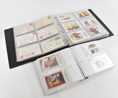 Lot 1065 - Two postcard albums mainly comprising Donald...