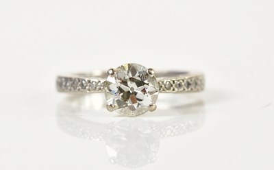 Lot 1279 - An 18ct white gold diamond solitaire ring, the...