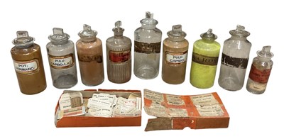 Lot 654 - A collection of nine apothecary bottles,...