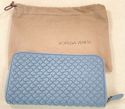 Lot 83 - BOTTEGA VENETA; a pale blue leather clutch bag,...