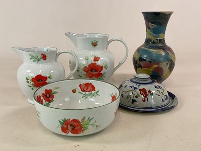 Lot 216 - ROYAL WORCESTER; two large graduated jugs and...