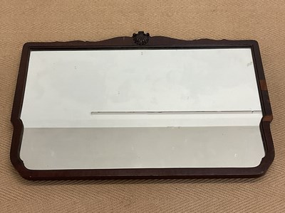 Lot 785 - A 19th century shaped mahogany wall mirror,...