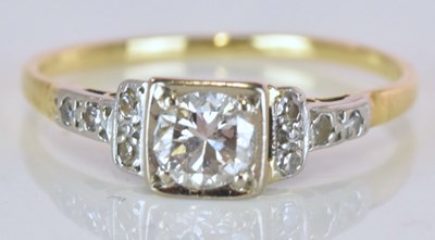 Lot 595 - An 18ct yellow gold platinum tipped diamond...