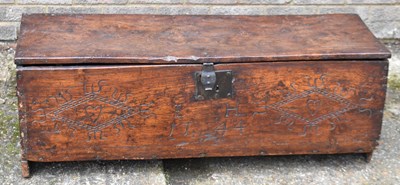 Lot 4 - An 18th century oak six plank coffer, the...