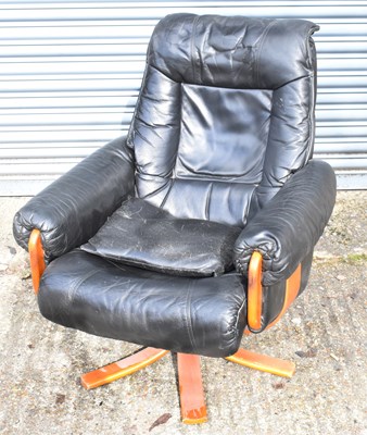 Lot 93A - A modern black leather adjustable armchair.