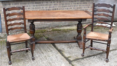 Lot 80A - An oak rectangular refectory table on baluster...