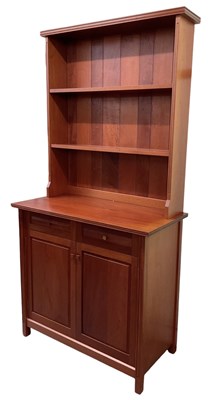 Lot 13 - PEARL DOT; a 1970s Brazilian mahogany bookcase,...