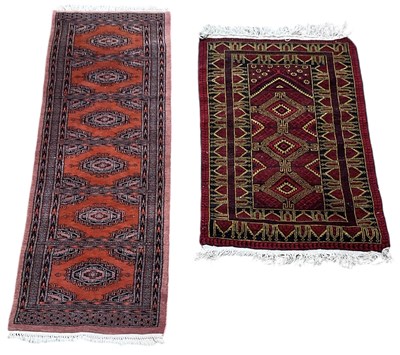 Lot 94 - A Persian red ground runner, with geometric...