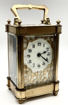 Lot 673 - A circa 1900 French brass carriage clock, with...