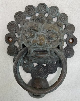 Lot 257 - A Chinese bronze door knocker, with raised...