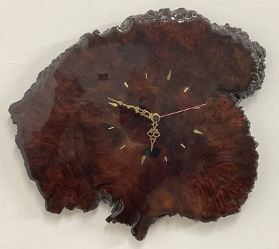 Lot 678 - An Australian jarrah wood clock, with quartz...