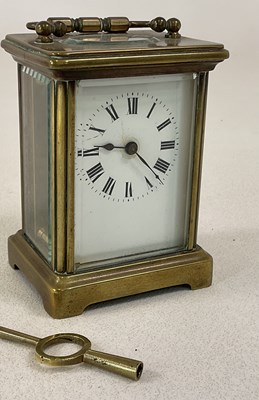 Lot 677 - A circa 1900 French brass carriage clock, with...