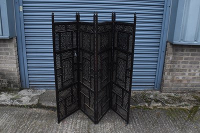 Lot 37 - An Eastern carved and pierced hardwood four...