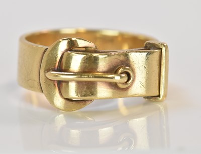 Lot 603 - A 9ct yellow gold buckle ring, size U, approx...