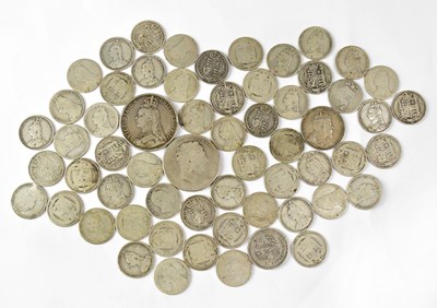 Lot 1039 - A collection of silver coinage to include two...