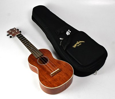 Lot 759 - A Sigma Guitars ukulele, length 59cm, in soft...