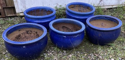 Lot 718 - Five blue glazed terracotta plant pots. height...