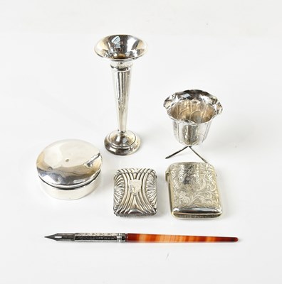 Lot 260 - A hallmarked silver vesta case with repoussé...