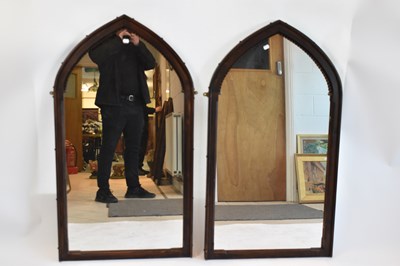 Lot 20 - A pair of stained pine Gothic style wall...