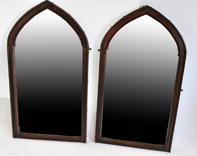 Lot 21 - A pair of stained pine Gothic style wall...