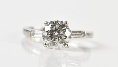 Lot 1271 - A platinum and diamond solitaire ring, the...