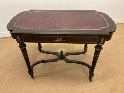 Lot 826 - A French ebonised writing desk on column...