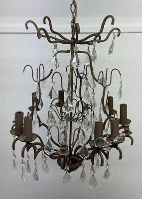 Lot 362 - A chandelier with metal and glass decorations...