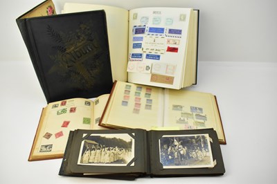 Lot 458 - Three world stamp albums, a Victorian scrap...