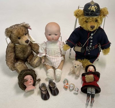 Lot 125 - STEIFF; three bears, one musical, one as a...