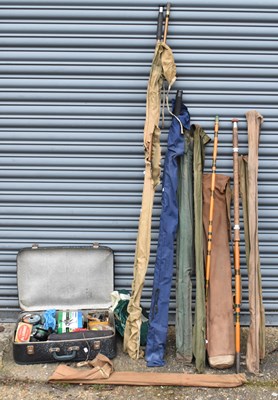 Lot 391 - A collection of eight assorted fishing rods...