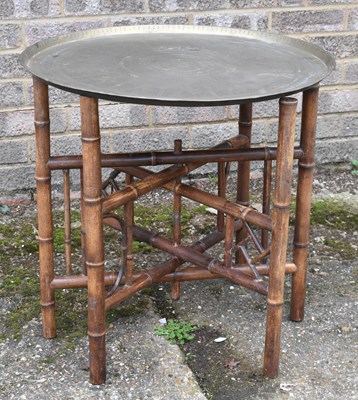 Lot 386 - A Benares type brass circular tray table,...