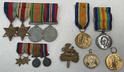 Lot 63 - A group of WWI and WWII medals, the 1914-1918...