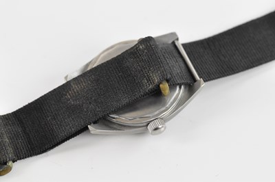 Lot 1879 - US NAVY; a manual wind wristwatch, the black...